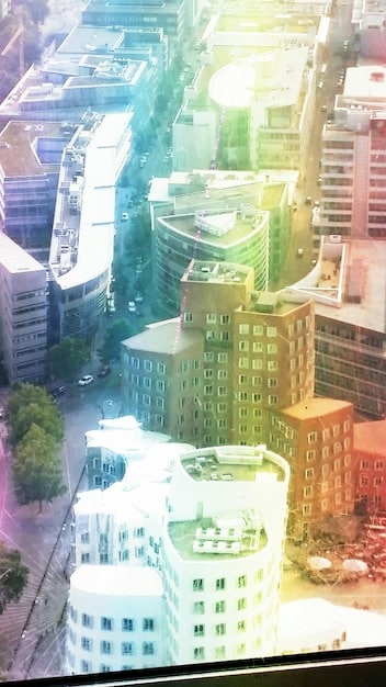 A collage image featuring different types of REIT sectors: residential buildings, warehouses, data centers, healthcare facilities, and retail spaces, each representing a different aspect of REIT diversification.