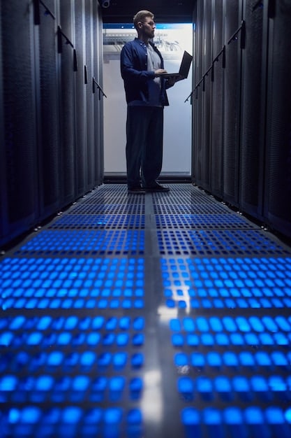 A professional photograph of a high-tech data center, showcasing rows of servers, advanced cooling systems, and monitoring equipment. The image emphasizes the stability and security of the facility.
