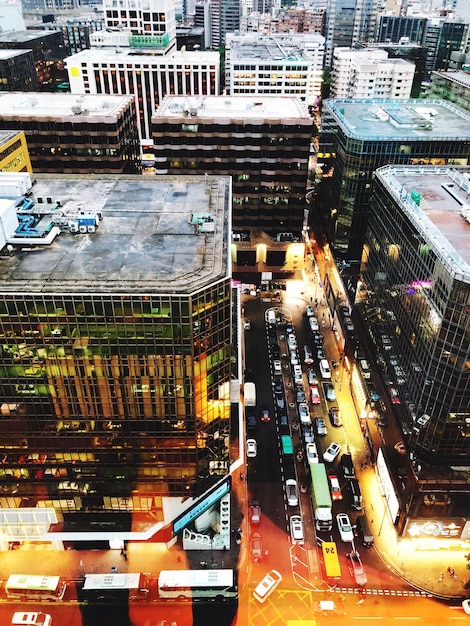 A collage of images representing different types of REITs (e.g., apartment buildings, shopping malls, data centers), with a magnifying glass hovering over them, symbolizing careful analysis and selection.