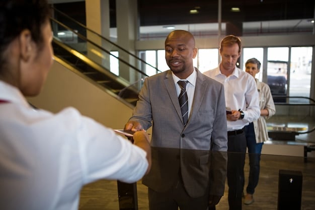 A photograph of a diverse and professional team of real estate managers in a conference room during a meeting. The team is reviewing blueprints and discussing strategies, showing collaboration and expertise. The room is modern and well-lit, emphasizing the professionalism of the setting.