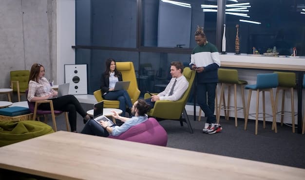 An interior shot of a modern coworking space within an office building.  The space is well-lit, with comfortable seating, large monitors, and people collaborating on projects.